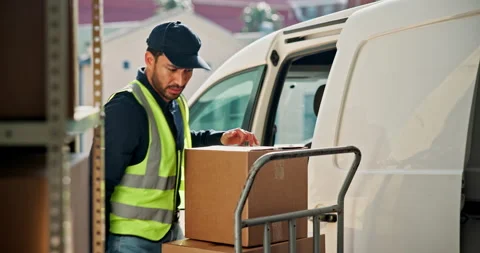 Man, unpacking and van with boxes for delivery, logistics or online order for 動画素材 346884015