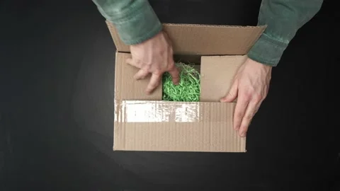 Man unpacking boxes. Gift Stock Footage 150361845