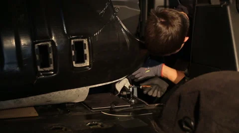 The man unscrews the bolt Stock Footage 56024013