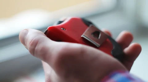 Man unscrews the screw with a screwdriver Video stock 68918946