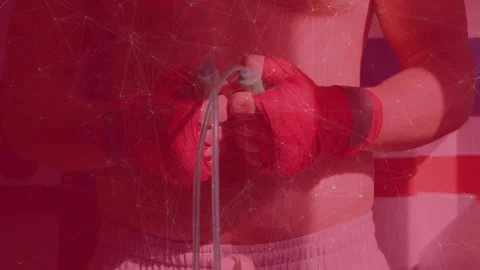 Man untwisting and aligning jump rope cords with red hand wraps, red overlay Stock Footage 330741613