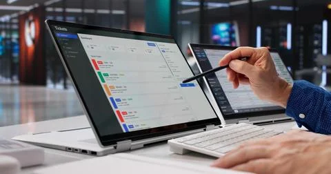 Man Upgrade System Ticket Software Remotely, Monitoring Hybrid Tablet Diagnos Stock Photos