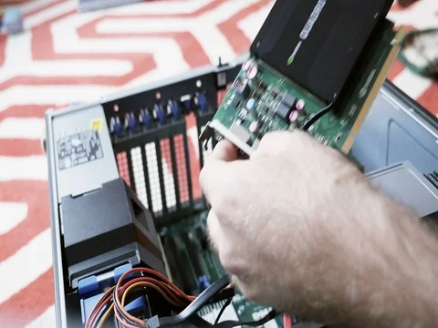 Man upgrading workstation computer GPU NVidia Quadra Stock Footage 69984352