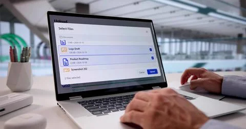 Man Uploading Data To Cloud Storage On Laptop Computer Platform, Data Analyst Foto stock