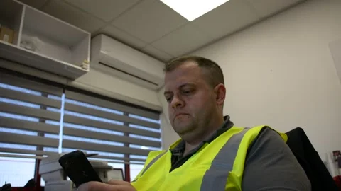 Man use cellular phone at workplace 動画素材 181112453