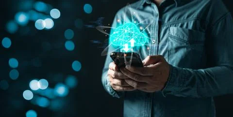 Man use cloud computing diagram show on smartphone.Data storage.the use of .. Stock Photos