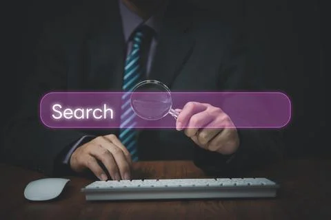 Man use computer to Searching for information.Search On Virtual Screen Data.. Foto stock