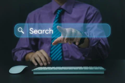Man use computer to Searching for information.Search On Virtual Screen Data.. Foto stock