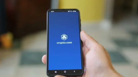 Man use crypto currency app on a smartphone,trading exchange,digital business Stock Footage 200382672