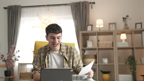 Man use digital tablet show papers letter document video call at home Stock Footage 264652552