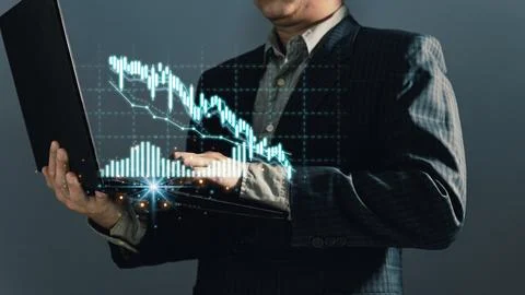 Man use graphs and progress of business and analyze financial,and investmen.. Stock Photos