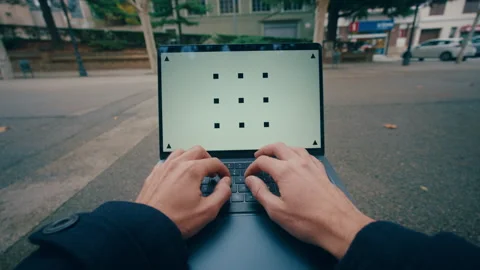 Man use laptop computer in city park with chromakey in display point of view Stock Footage 256640991