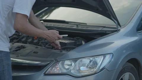 Man use mobile phone check insurance due to accident car through a mobile app Video stock 221537269