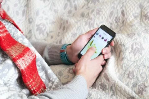Man use a mobile phone on winter Stock Photos