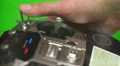 The man use the remote control for the drone on a green background. Real time 4k or 4k+ Resolution