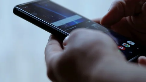 Man use smartphone to check mail,texting chat,tech addiction,quarantine covid Stock Footage 129550446