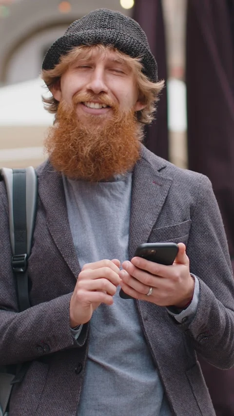 Man use smartphone looking for a way route on map in mobile navigator app Stock Footage 347615560