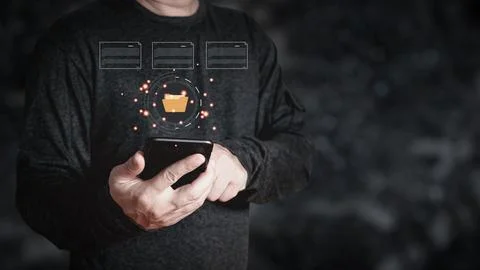 Man use smartphone to manage data,Document Management System (DMS),knowledg.. Stock Photos