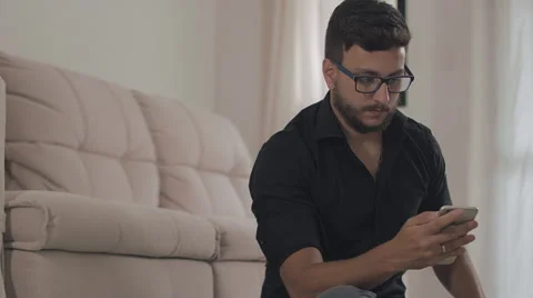 Man use a smartphone to share in internet 動画素材 59328880