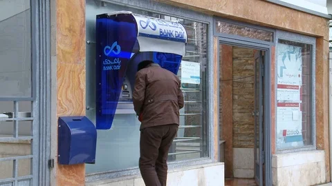 Man uses ATM, Tehran, Iran Video stock 119197941