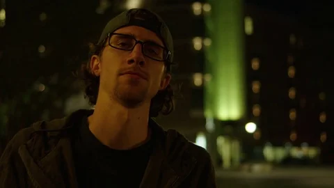 Man Uses Cell Phone at Night Stock Footage 77208252