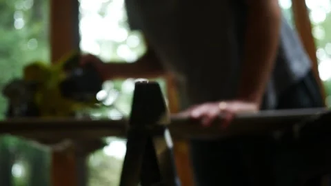 Man uses Circular Saw to Cut Composite Deck Board 3 Vidéo 344826224