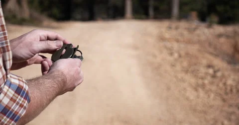 Man Uses Compass 01 Stock Footage 56025376