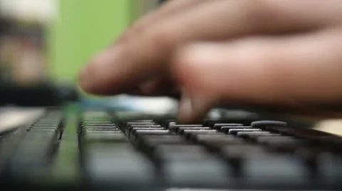Man uses computer keyboard Stock Footage 60744128