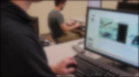 Man uses the computer lab at a university Stock Footage 50376614