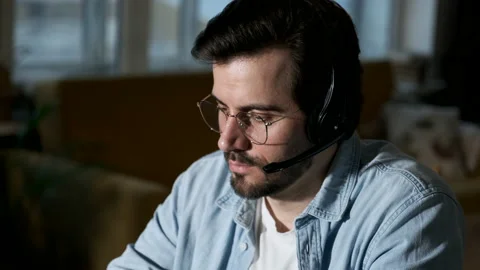 A man uses a computer works at home, businessman working on desk at home Stock Footage 144375772