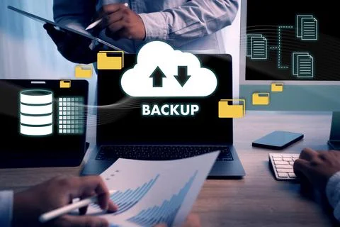Man uses computers. Online backup technology, data storage on a laptop, dig.. Foto stock