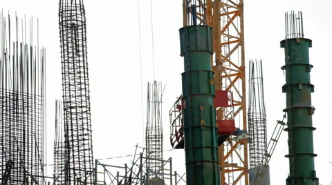 Man uses construction site elevator, skyscraper building, Tel-Aviv, Israel Stock Footage 60852410