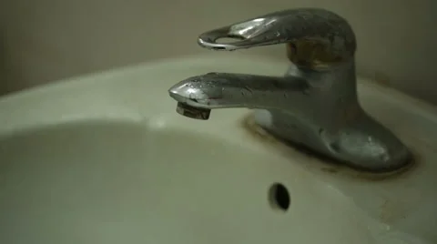 A man uses a faucet Stock Footage 55710148