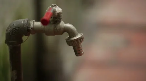A man uses a faucet Stock Footage 55710156