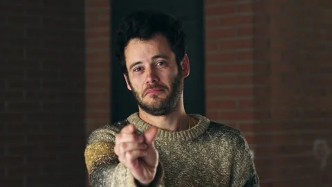 Man uses fingers to show something very small Stock Footage 306682166