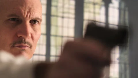A man Uses a Firearm to Defend His Home and Property 스톡 동영상 236881799