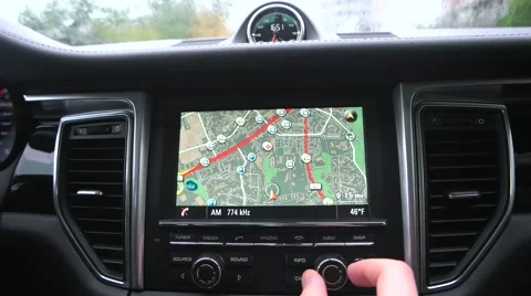Man uses a gps navigator in the car Stock-Footage 68565932
