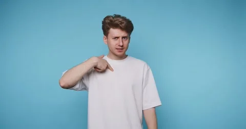 Man uses hand signs to communicate meanings in four frames against a blue b.. 스톡 동영상 331990864