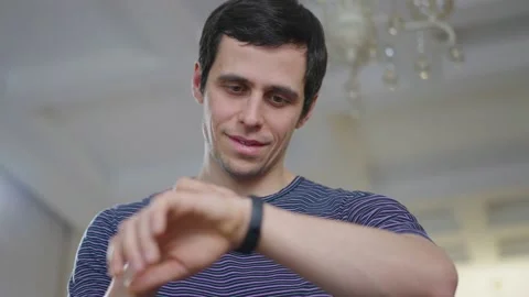 Man uses his smart watch Stock Footage 148336766