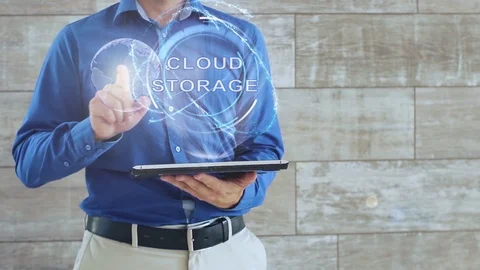 Man uses hologram with text Cloud storage Stock Footage 116114307