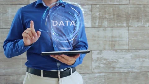 Man uses hologram with text Data Video stock 111971031
