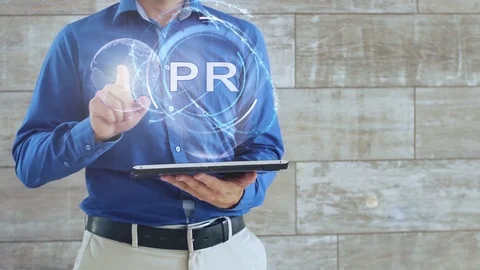 Man uses hologram with text PR Stock Footage 112983800