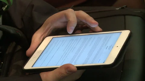 Man uses internet from his smartphone Stock Footage 56572890