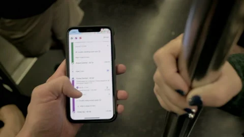 A Man uses iPhone with Google maps while in subway in New York City. With Vídeo Stock 138637808