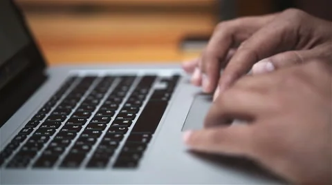 A man uses a laptop Stock Footage 44464283