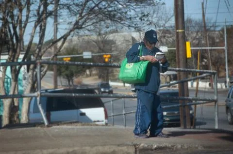 Man Uses a Map Stock Photos