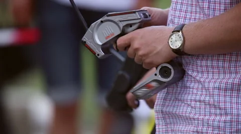 The man uses the remote control Stock Footage 64570723