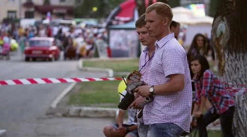 The man uses the remote control Stock Footage 64570739