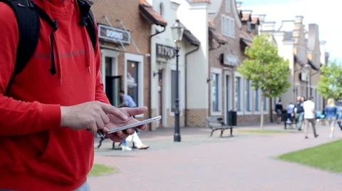 A man uses a smartphone. Stock Footage 64744608