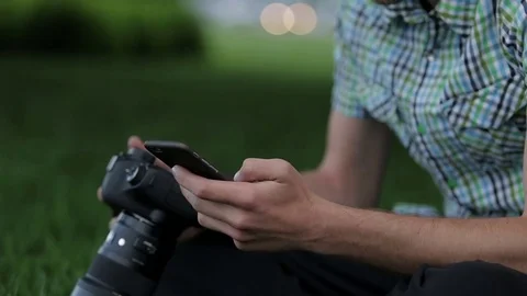 Man uses a smartphone Stock Footage 70681446